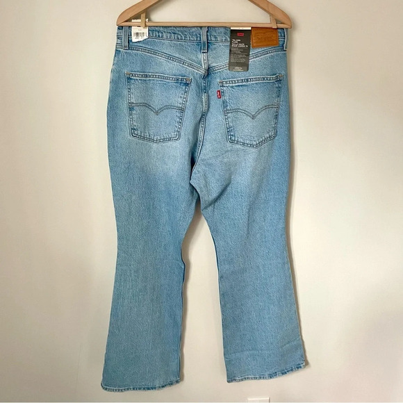Levi's 70's High Rise Flare Jeans Light Wash  32 - Picture 6 of 9